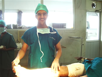 Orthopaedician taking care of a patient in cast